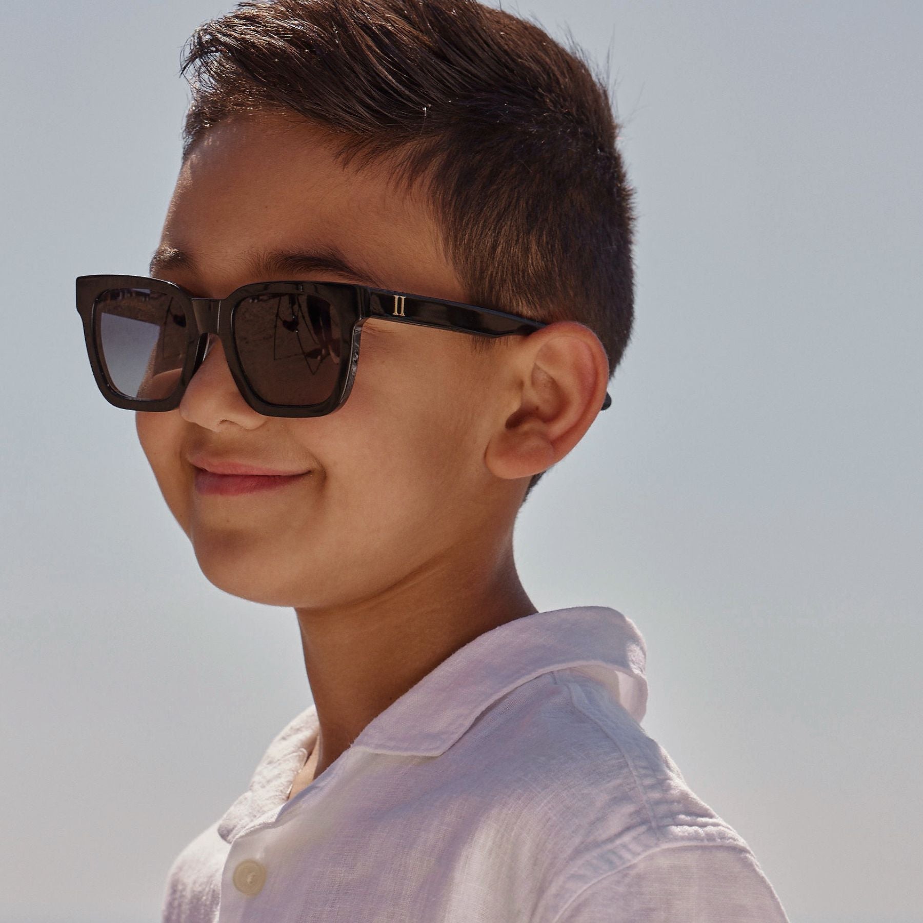 Kids Modern Sunglasses, Kids Polarized Sunglasses, Aesthetically pleasing sunglasses for kids, black sunglasses kids, kids accessories, summer essentials for kids, kids vacation essentials, high quality sunglasses made by optometrists, kids square sunglasses, child sunglasses